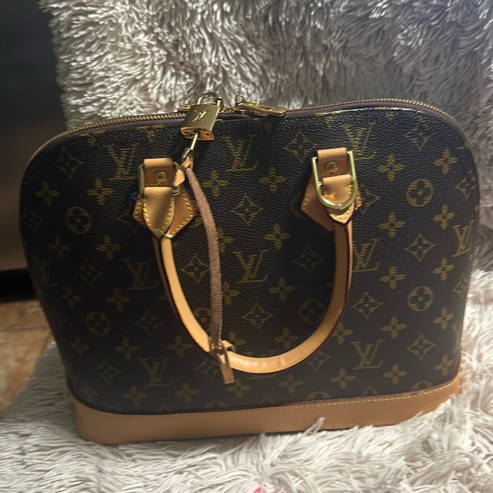 LOUIS VUITTON MONOGRAM ALMA PM. Authentique